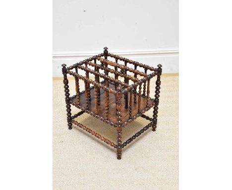 A Victorian rosewood four division bobbin Canterbury.
