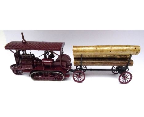 Toy Army Workshop Holt Caterpillar Tractor 1916 burgundy finish, with driver and log trailer with five logs (Condition Excell