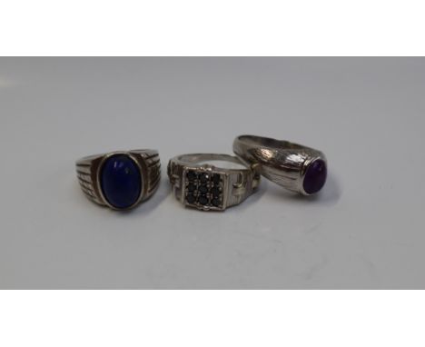 A Gentleman's 9ct white gold signet ring, set with an oval cabochon amethyst, size Y 1/2, together with another gem set 9ct w