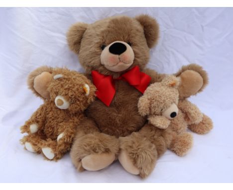 A Steiff Fynn teddy bear together with two other plush Steiff teddy bears