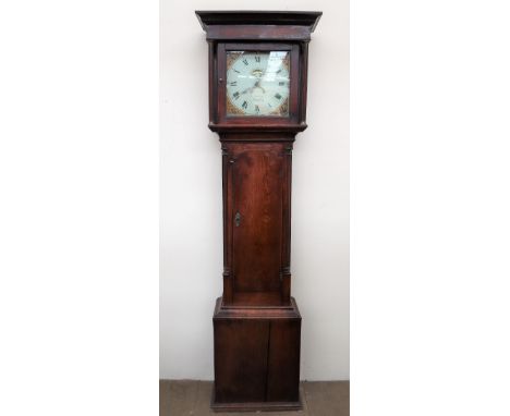 An 18th century oak longcase clock, the hood with a moulded cornice and fluted pilasters above a long trunk door and box base