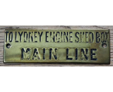 Railwayana - A brass signal box shelfplate "TO LYDNEY ENGINE SHED BOX MAIN LINE", 12 x 4cm, with partial black wax infill