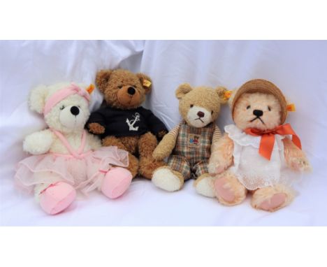 A modern Steiff teddy bear together with a Steiff ballerina and two other Steiff teddy bears