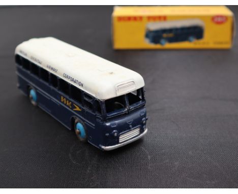 A Dinky Toys diecast model of a B.O.A.C. Coach, with a dark blue body, white roof and light blue hubs, No.283, boxed