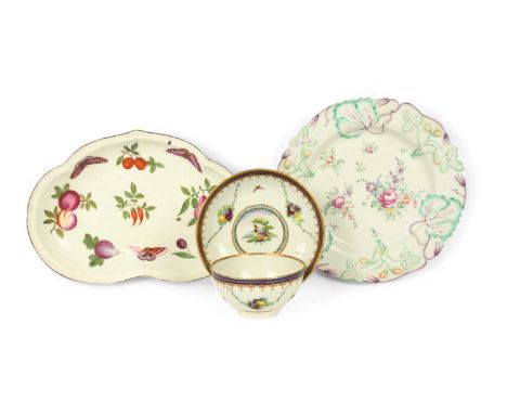 A Longton Hall strawberry plate, c.1756, the well painted with sprays of flowers, the rim moulded with fruiting sprays, a Che