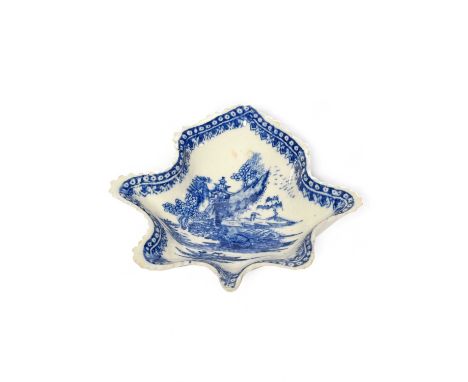A rare New Hall blue and white pickle dish, c.1785, of leaf shape, printed with the Gazebo pattern within a cell diaper and l