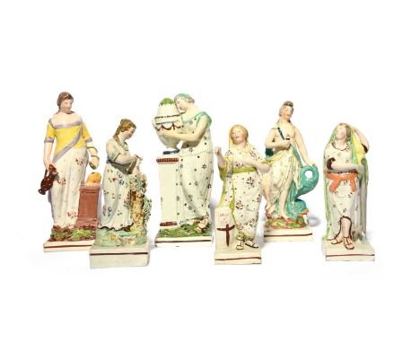 Six Staffordshire pearlware figures of Classical maidens, early 19th century, including a near pair of Faith and Hope, a figu