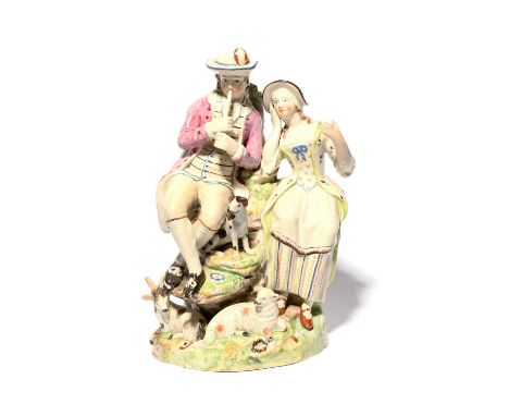 A Staffordshire pearlware group of rustic lovers, 1st half 19th century, seated on a rocky outcrop, he playing the flageolet,