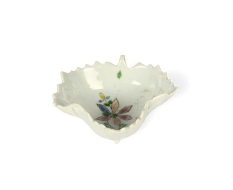 A rare Vauxhall pickle dish, c.1756, of deep leaf shape, painted with a polychrome flower spray and narrow leaf tendrils, rai