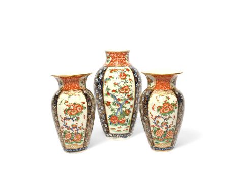 A garniture of three Worcester vases, c.1768-70, the baluster forms richly decorated in a panelled Japan pattern, with Kakiem