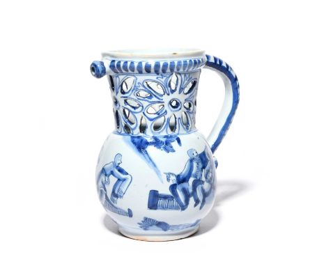 An unusual Delft puzzle jug, 18th century, the globular body painted in blue with a figure holding out a cloth or garment to 