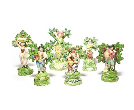 Six Staffordshire figures, c.1820, all engaged in rural pursuits, two figures of gardeners, one of a shepherd holding a lamb,