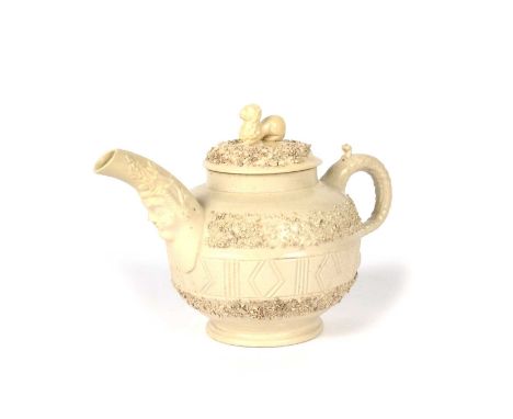 A small Staffordshire salt-glazed stoneware teapot and cover, c.1760, the globular body incised with a geometric band between