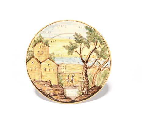 A small Castelli maiolica plate, 1st half 18th century, painted in the manner of Antonio Grue with figures standing between b