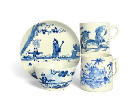 A Bow blue and white teabowl and saucer, c.1758-60, painted with the Golfer and Caddy pattern, an early Bow small mug painted
