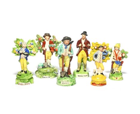 Six Staffordshire figures of rural workers, 1st half 19th century, one holding a pick and shovel and titled 'The Poor Laborer