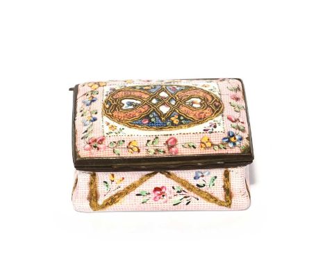 A Staffordshire enamel linen ground snuff box, c.1770-80, the rectangular cover decorated with a raised figure of eight motif