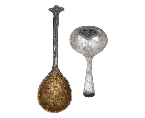 An early Victorian cast silver caddy spoon and a George III silver caddy spoonfirst London, 1853, George Adams, silver gilt a