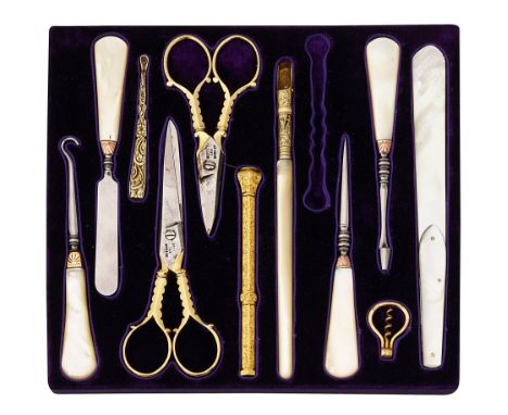 A Victorian fitted tray of tools from a dressing box retailed by Apsreythe blue velvet fitted tray containing a silver-gilt h