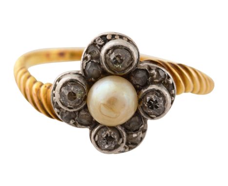 An Edwardian pearl and diamond ringthe central pearl (untested) to the diamond-set quatrefoil surround, each set with old-cut