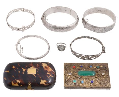 A group of hinge bangles and assorted itemstwo silver hinge bangles, both chased with a scrolling foliate design and both hal