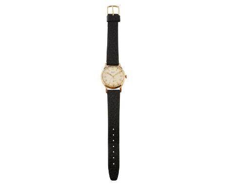 A 9ct gold Avia manual wind wrist watch the champagne dial with alternating Arabic and baton markers, 15 jewel movement, case