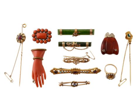 A group of mostly late 19th century jewelleryincluding two coral brooches, two yellow gold stick pins, one set with a garnet 