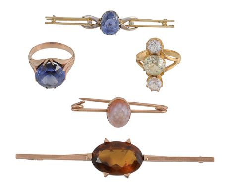 Five items of jewelleryan oval sapphire and diamond-set bar brooch; a circular-cut sapphire ring (untested but possibly treat