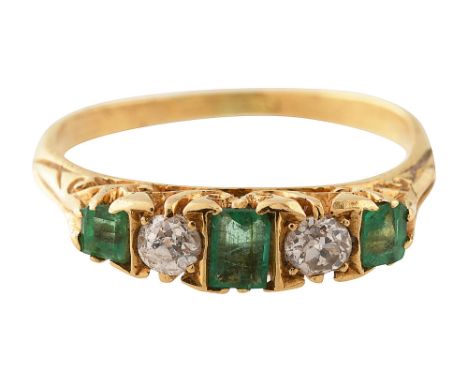 An emerald and diamond five stone ring the three rectangular-cut emeralds each separated by an old brilliant-cut diamond, pie