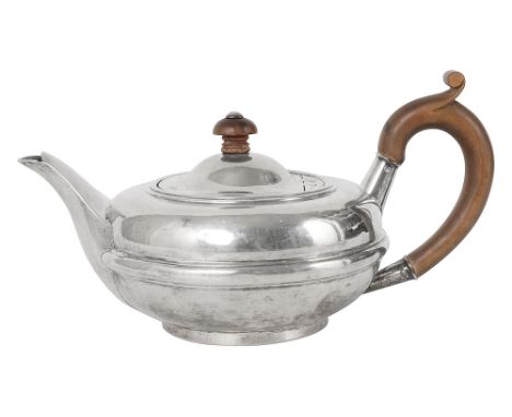 An Edwardian silver bachelor's teapotChester, 1908, William Neale &amp; Sons, of circular squat form with a central band and 