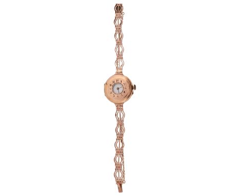 A lady's 9ct gold half hunter manual wind wristwatchwhite enamel dial with black Roman numerals, minute track and gold hands,