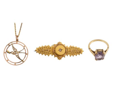 A group of ladyÕs accessoriesEtruscan style 15ct gold bar brooch, stamped Ô15Õ with safety chain; purple gem set ring, stampe