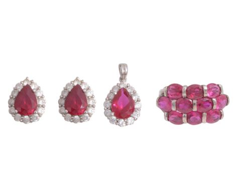 Three ruby items:   a pendant and pair of earrings en suite, all centrally set with a pear-shaped ruby (untested but probably