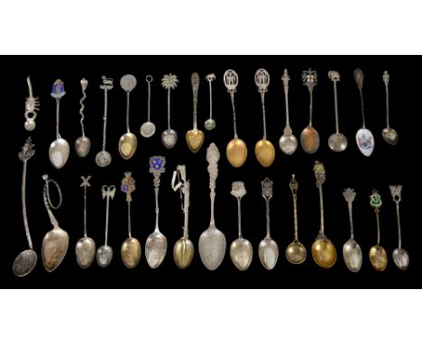 A collection of silver souvenir, commemorative and other spoons to include a late Victorian Novelty Lee Metford Rifle Anglo B