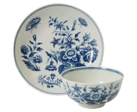 A First Period Worcester blue and white 'Three Flowers' Pattern tea bowl and saucer c.1770the teabowl with blue hatched cresc