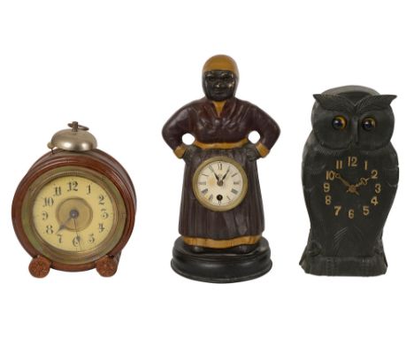 A carved wood novelty owl clock1930s/40sthe eyes moving when the mechanism is in motion, together with an Ansonia clock, in t