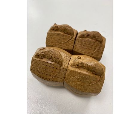 Robert 'Mouseman' Thompson of Kilburn, Four oak napkin ringsoctagonal from with carved mouse signatures, (4)length 5 cm.Condi