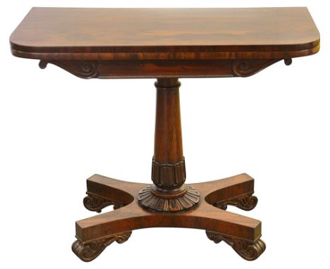 A William IV rosewood card tablecirca 1830the foldover top revealing a blue baize playing surface, the tapered column with a 