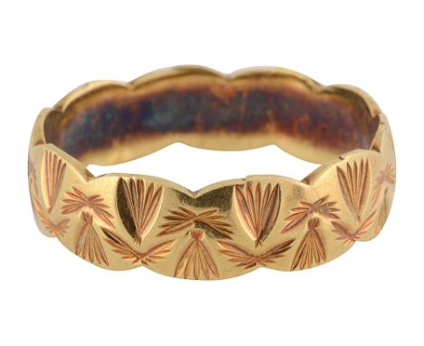 An 18ct gold bandwith chased abstract design and London hallmarksapprox total weight 4.7g, ring size SCondition: 