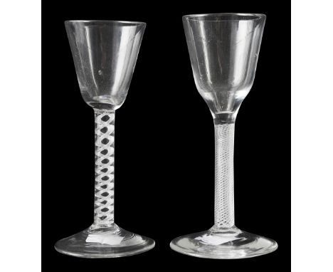 Two 18th century airtwist single series wine glasses c.1745first round funnel on a stem with a pair of spiral cables, second 