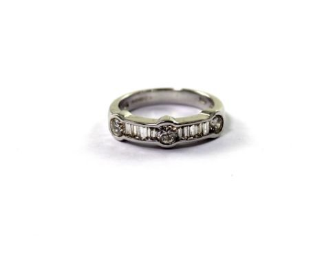 An 18ct white gold ladies' dress ring set with baguette and small diamonds, total diamond weight approx 0.5ct, size K, approx