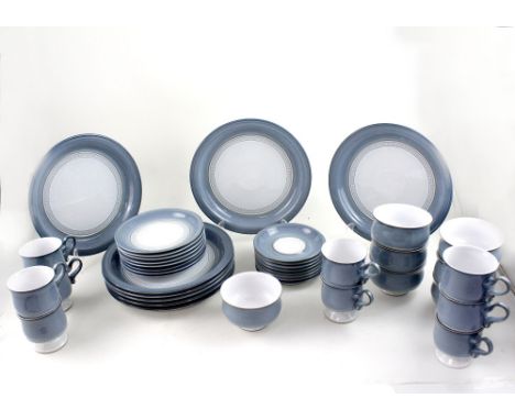 A quantity of blue ceramic teaware.