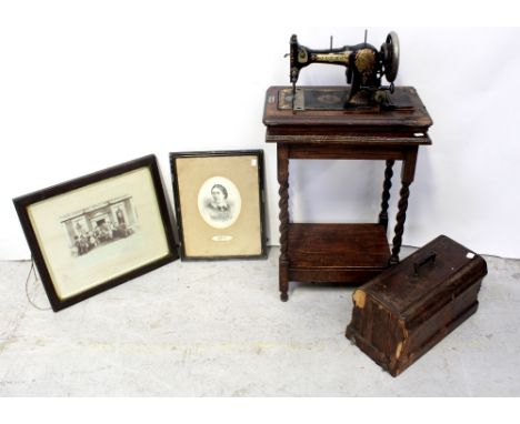 An early/mid-20th century mahogany rectangular hall table of small proportions with lower shelf to wrythen support and ball f