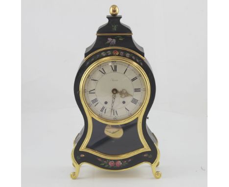 A 20th century French-style eight-day mantel clock, black wooden case with floral painting, the ceramic dial set with Roman a
