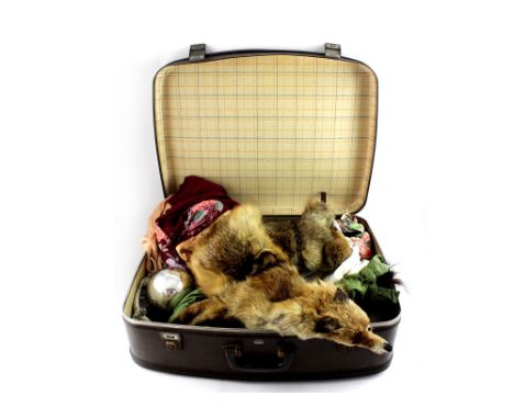 A vintage suitcase containing early 20th century fox furs, a c1920s Japanese silk kimono and two large Victorian Christmas ba