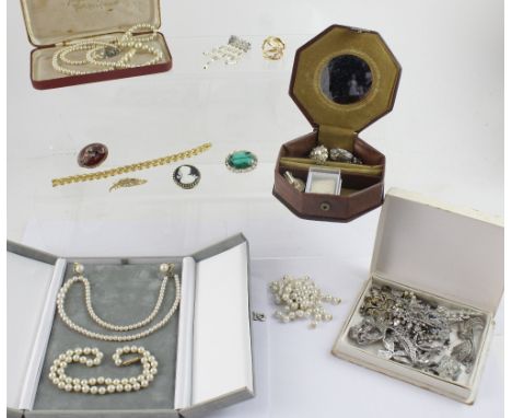 A quantity of vintage and contemporary costume jewellery to include brooches, earrings, bracelets, necklaces etc.