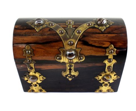 A 19th century coromandel twin-section tea caddy in the form of a treasure chest with brass decoration and agate roundels, bl