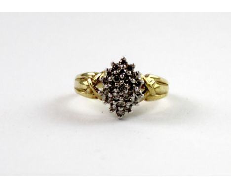 A 9ct yellow gold ladies' dress ring set with small diamonds, size O, approx 4.2g.