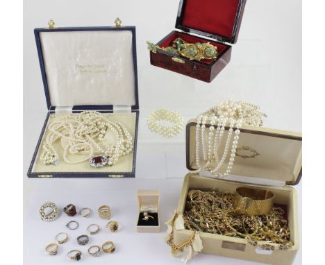 A quantity of vintage and contemporary jewellery to include a quantity of faux pearl necklaces, chains, bracelets, brooches, 