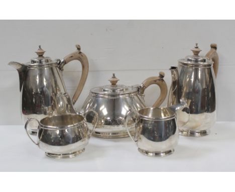 An Elizabeth II hallmarked silver five-piece tea service comprising teapot, coffee pot, hot water jug, sucrier and milk jug, 